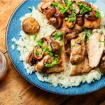 Rice with chicken thighs and mushrooms