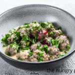 Sheet Pan Meatballs with Tomato Salad and Green Sauce